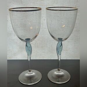 2 Crystal, gold rimmed wine glasses with blue glass stem.  8.25”
